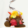 Strawberry icecream with chocolate sauce