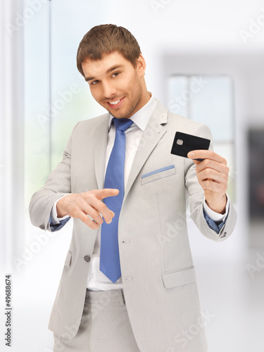 Photo: businessman with credit card businessman with credit card