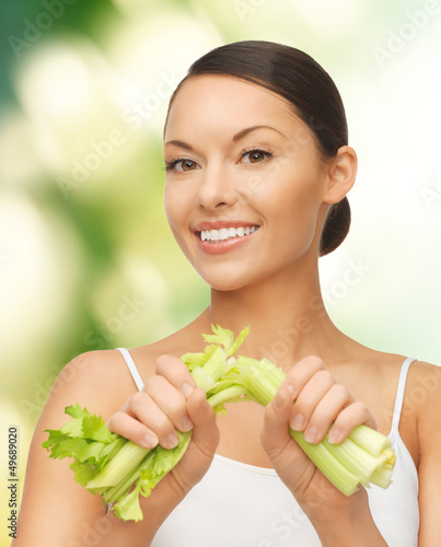Photo: woman with fresh celery woman with fresh celery