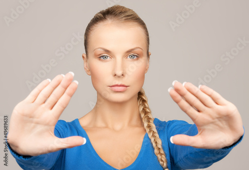 Photo: woman making stop gesture woman making stop gesture