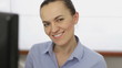 Happy business woman smiling to camera, close up