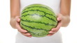 Watermelon - woman showing whole watermelon