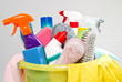 full box of cleaning supplies and gloves isolated on white