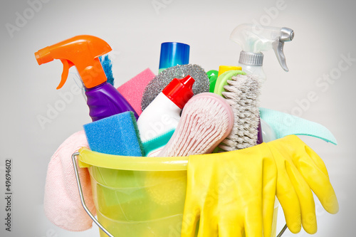 Photo: full box of cleaning supplies and gloves isolated on white full box of cleaning supplies and gloves isolated on white