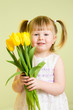cute little girl with flower gift on green background