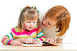 Photo: happy mother and child reading a book together happy mother and child reading a book together