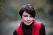 A portrait of a woman in autumn time