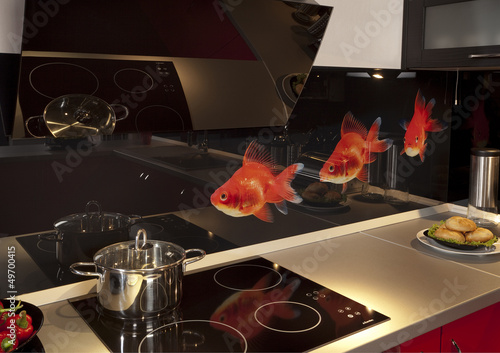 Photo: modern kitchen and a stove with a pan modern kitchen and a stove with a pan