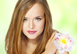 Portrait Beautiful girl with flower.