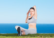 Stretching every muscle before her workout