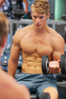 Photo: Watching his form while working his bicep Watching his form while working his bicep