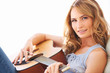 Making sweet sounds on her guitar