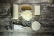 bath accessories on brown wooden background