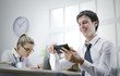 Photo: businessman using smart phone in office businessman using smart phone in office