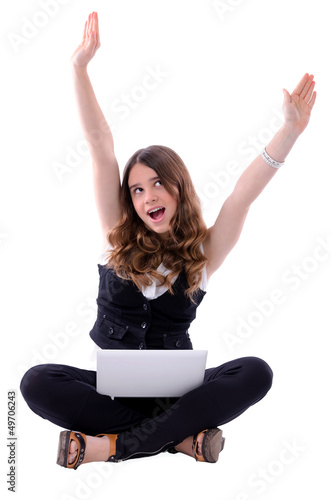 Photo: Teen happiness with notebook Teen happiness with notebook