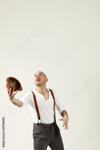 Photo: man throws his hat in air man throws his hat in air