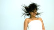 Video: Smiling woman jumping in a white towel Smiling woman jumping in a white towel