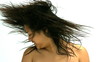 Brunnette tossing her hair