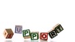 Support spelled out in letter blocks falling over