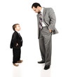 Young father and his son wearing suits