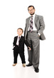 Young father and his son wearing suits