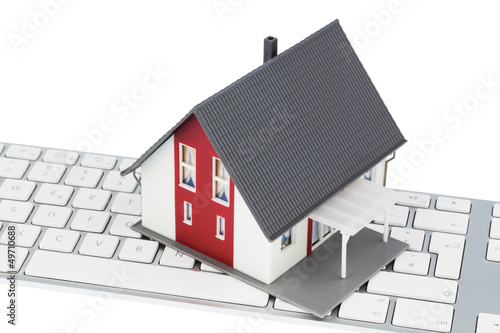 Photo: Wohnhaus auf Tastatur Wohnhaus auf Tastatur