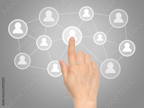 Photo: Hand pressing virtual social media icon . Hand pressing virtual social media icon .