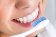 Photo: beautiful young woman picking his teeth beautiful young woman picking his teeth