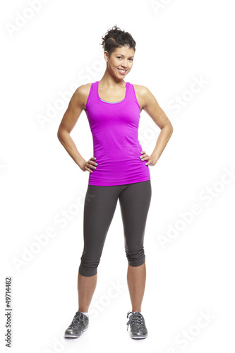 Photo: Young woman relaxing in sports outfit Young woman relaxing in sports outfit