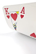 Photo: Playing cards in poker isolated over white Playing cards in poker isolated over white