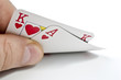 Photo: Playing cards in poker isolated over white Playing cards in poker isolated over white