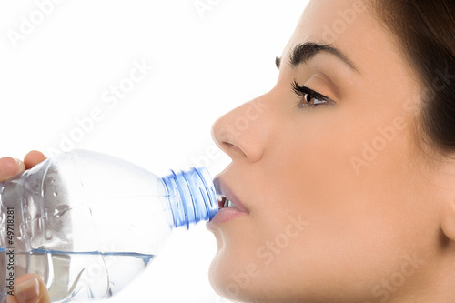 Photo: Young woman drinking water Young woman drinking water