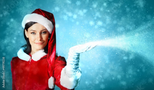 Photo: Portrait of girl wearing santa claus clothes Portrait of girl wearing santa claus clothes