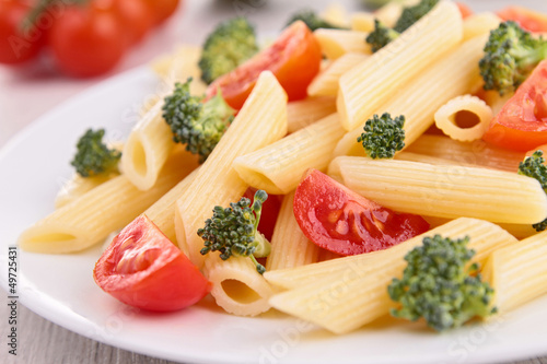 Photo: plate of pasta with tomato and broccoli plate of pasta with tomato and broccoli