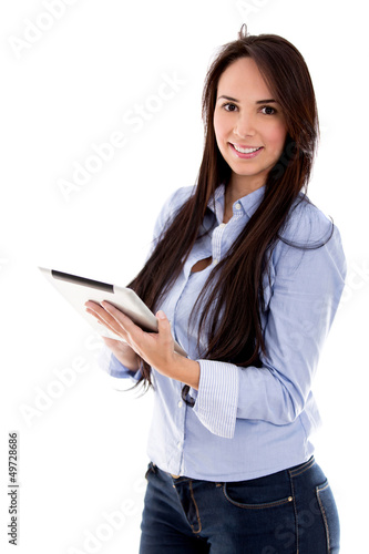 Photo: Casual woman using a tablet Casual woman using a tablet