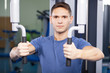 Photo: Portrait of a trainer in a fitness center Portrait of a trainer in a fitness center