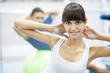Photo: Cheerful young couple in a gym Cheerful young couple in a gym