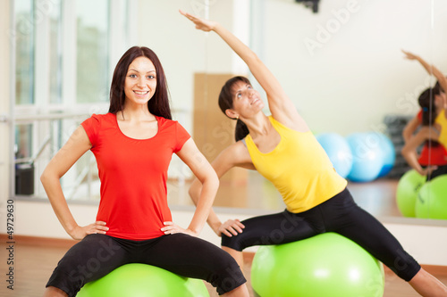 Photo: Group training in a gym of a fitness center Group training in a gym of a fitness center