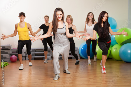 Photo: Group training in a gym of a fitness center Group training in a gym of a fitness center