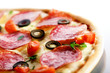 Pizza with salami and black olives. macro