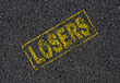 Losers word stamped on asphalt background