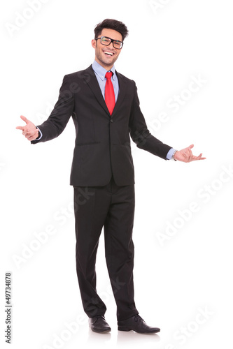 Photo: business man wellcomes everybody business man wellcomes everybody