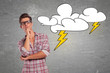 man with glasses facing a big problem