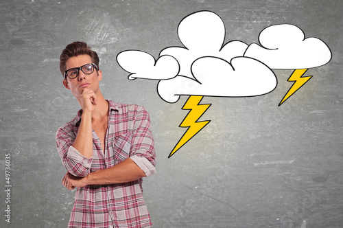 Photo: man with glasses facing a big problem man with glasses facing a big problem
