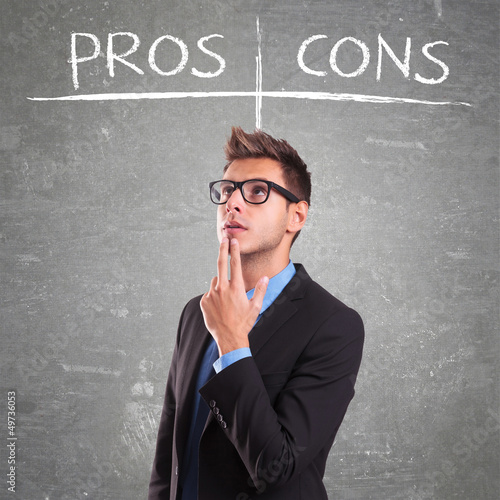 Photo: business man in front of a decision business man in front of a decision