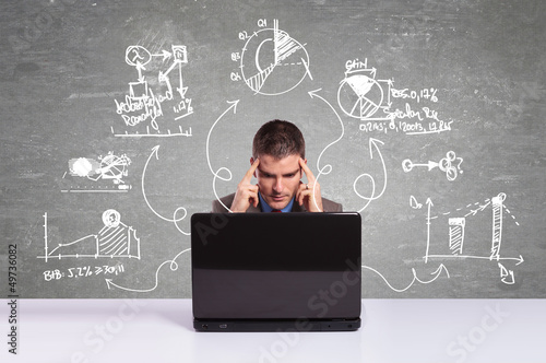Photo: business man thinking about new projects business man thinking about new projects
