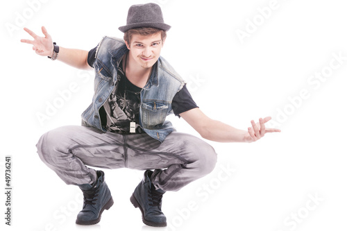 Photo: crouched dancer welcoming crouched dancer welcoming