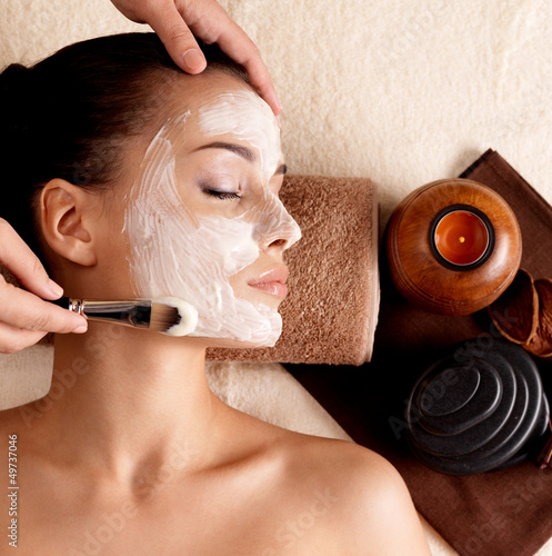 Photo: Spa therapy for woman receiving facial mask Spa therapy for woman receiving facial mask