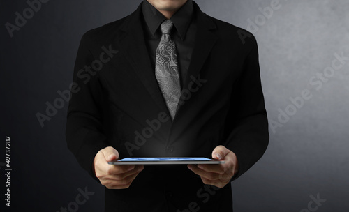 Photo: touch screen ,touch- tablet in hands touch screen ,touch- tablet in hands