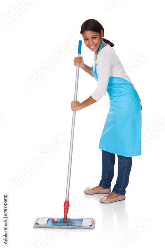 Photo: Cheerful Woman Having Fun While Cleaning Cheerful Woman Having Fun While Cleaning